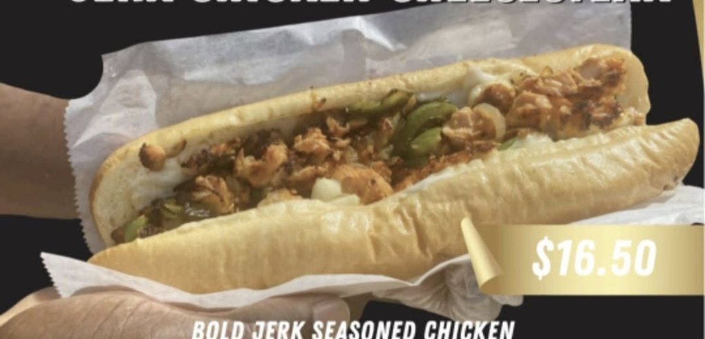 Jerk chicken cheesesteak on a toasted roll